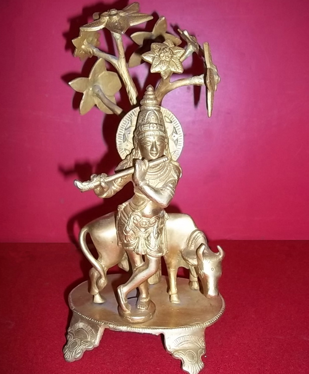 Lord Krishna under tree with cow